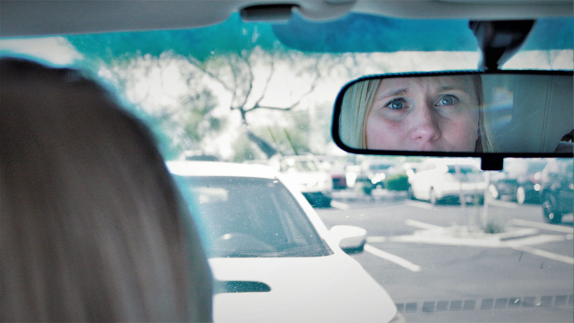 Woman in car | truck gun
